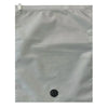 A clear reusable vacuum storage bag lying flat against a light gray background.