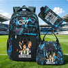 A black and blue sports backpack featuring Cristiano Ronaldo graphics and a separate rain cover, placed on a green field.