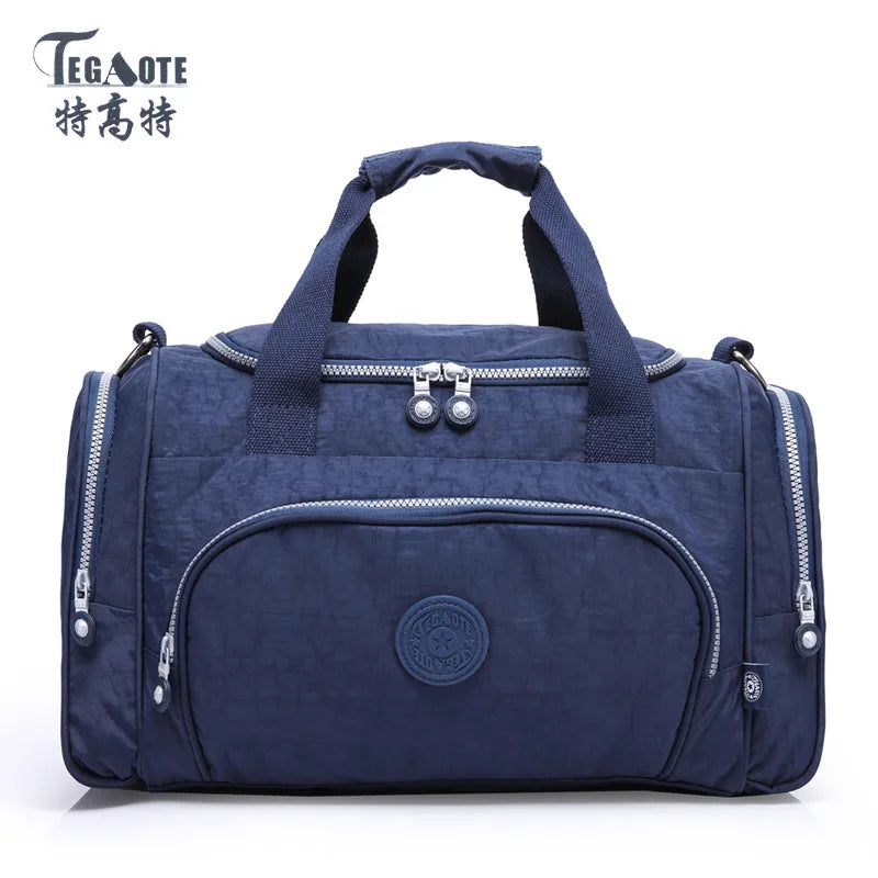 Navy blue durable nylon travel duffle bag with zippered compartments and handles