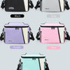 A collection of insulated reusable lunch bags in black, gray, purple, pink, and green.
