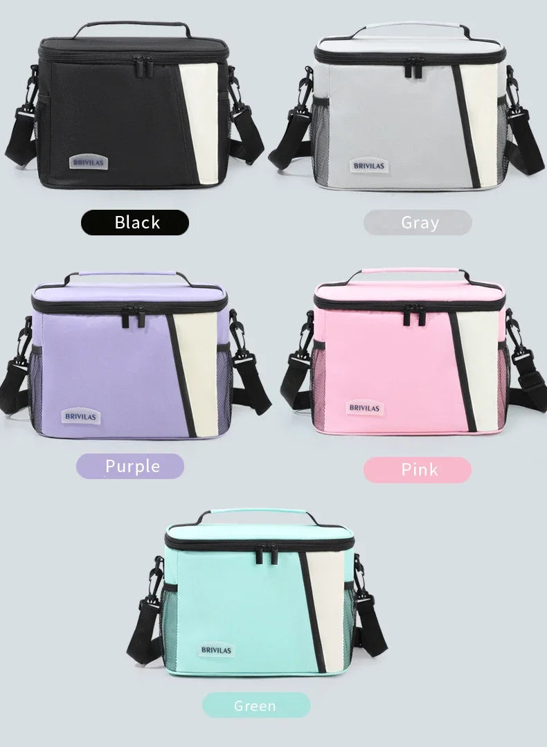 A collection of insulated reusable lunch bags in black, gray, purple, pink, and green.