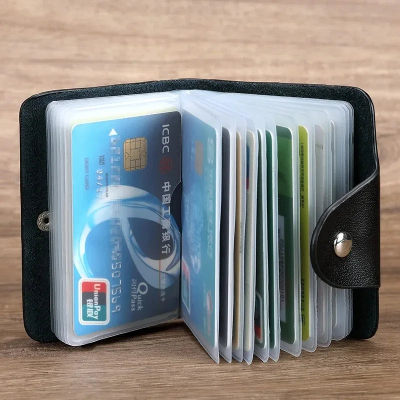 A black PU leather wallet holding several plastic cards and ID documents.