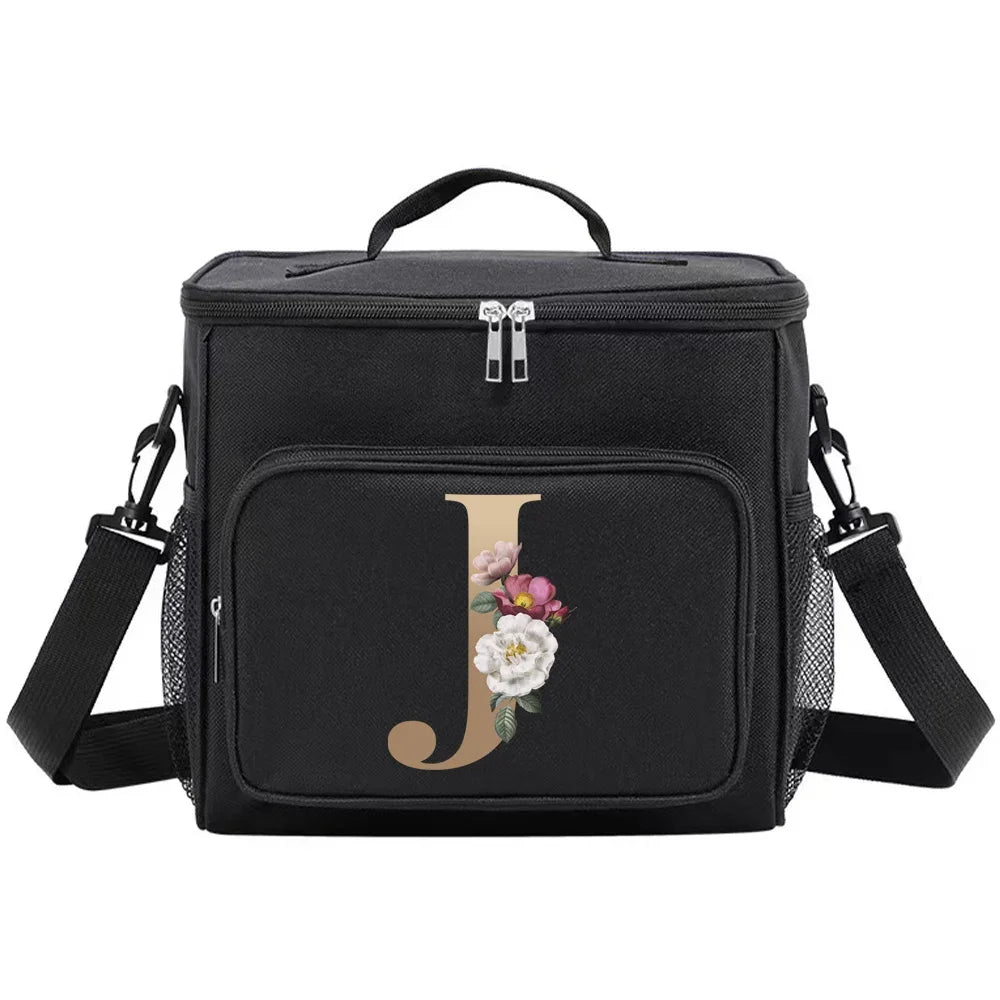 Black insulated canvas lunch bag with dual handles featuring a gold letter J embroidery