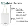 White canvas tote bag with handles and measurements displayed.