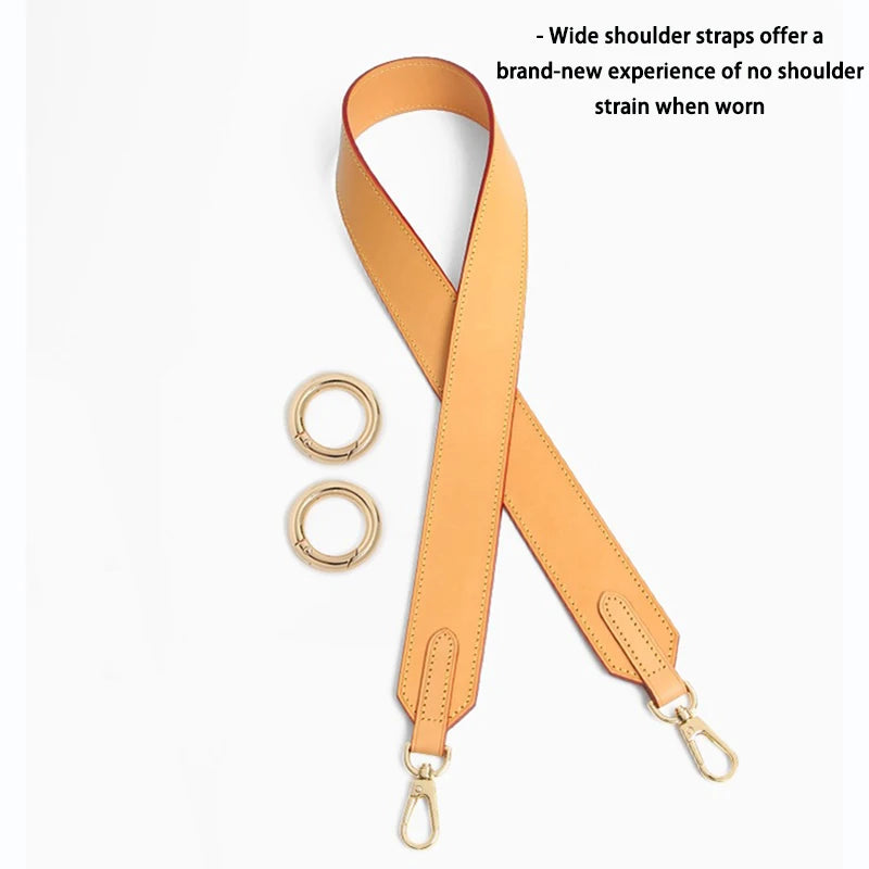 A tan adjustable wide shoulder strap is shown with attached metal rings.