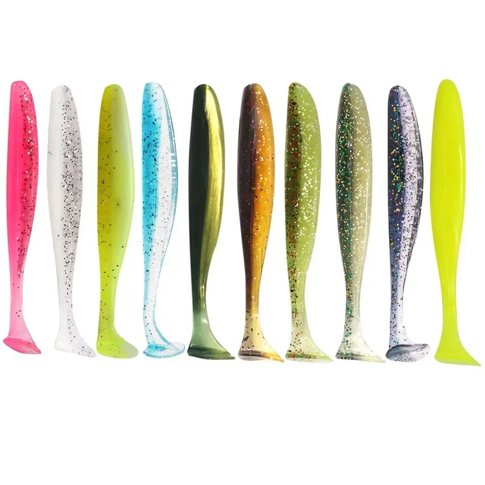 A row of colorful adjustable soft lure fishing tackle, featuring various shades of pink, green, and blue.