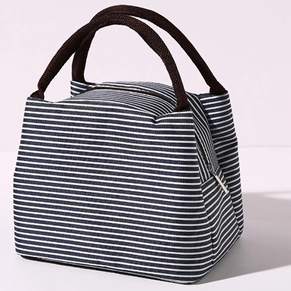 A navy and white striped insulated lunch tote bag with a brown adjustable shoulder strap.