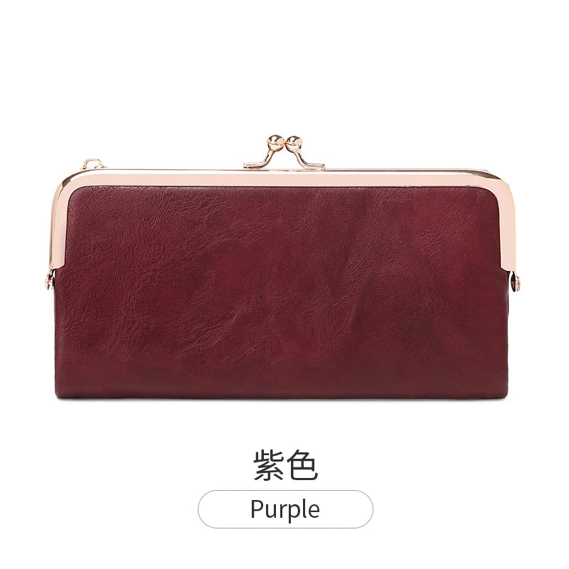 Marron-Leder-Vintage-Geldbörse mit goldenen Zierelementen.
