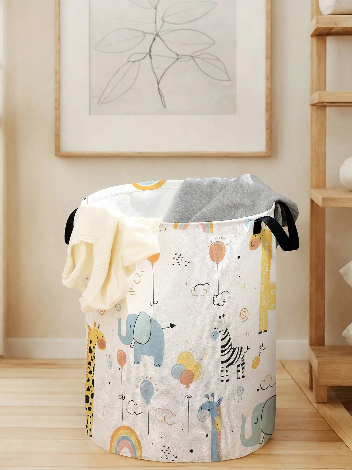 A white canvas laundry and storage basket decorated with colorful animal illustrations.