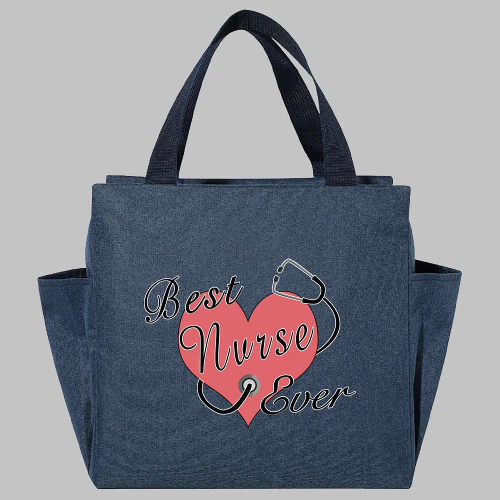 Bolsa de almuerzo de lona azul oscuro con diseño de corazón rosa y el texto 'La mejor enfermera de todos'
