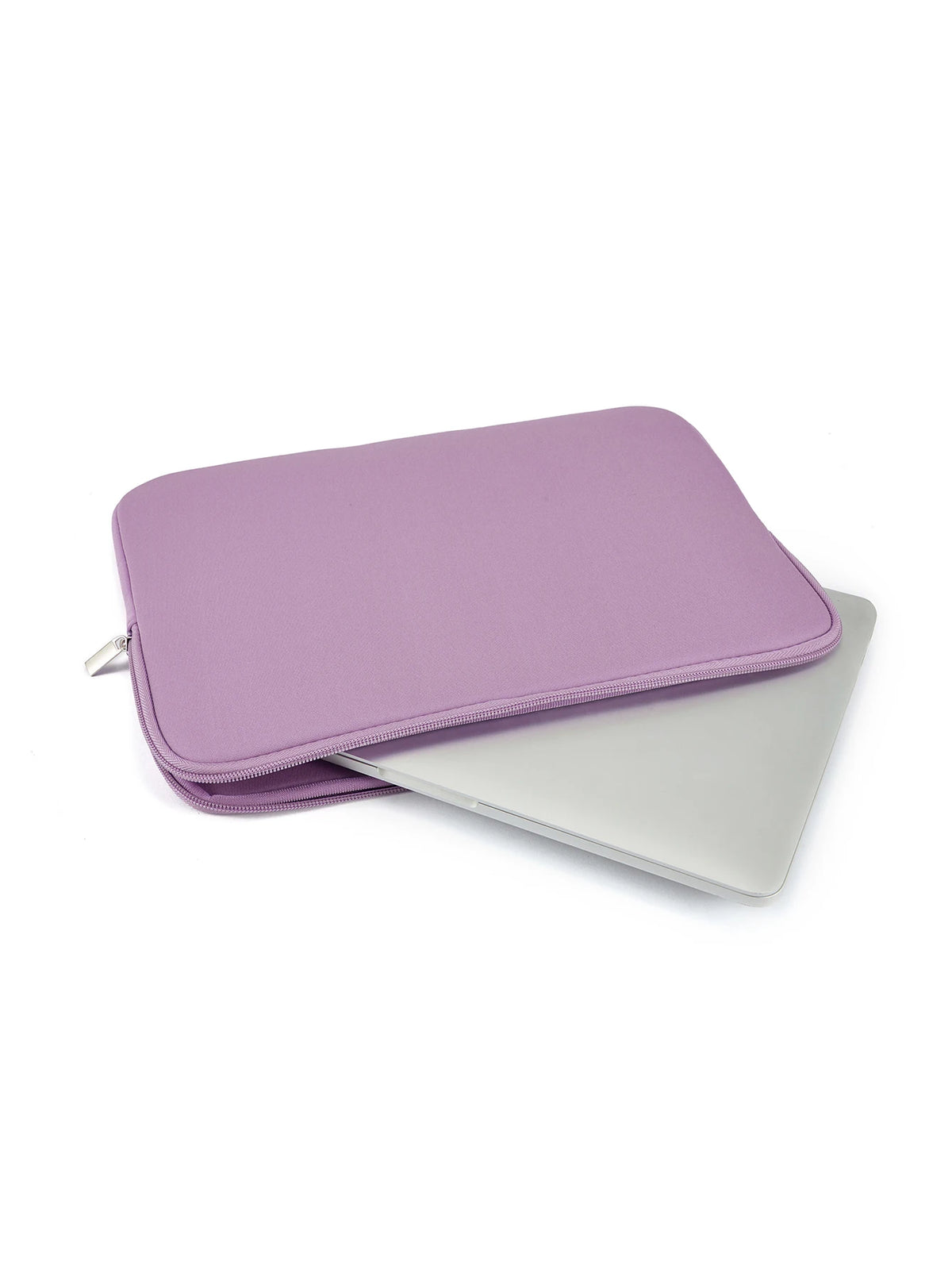 A purple multi-size laptop sleeve placed next to a silver laptop.