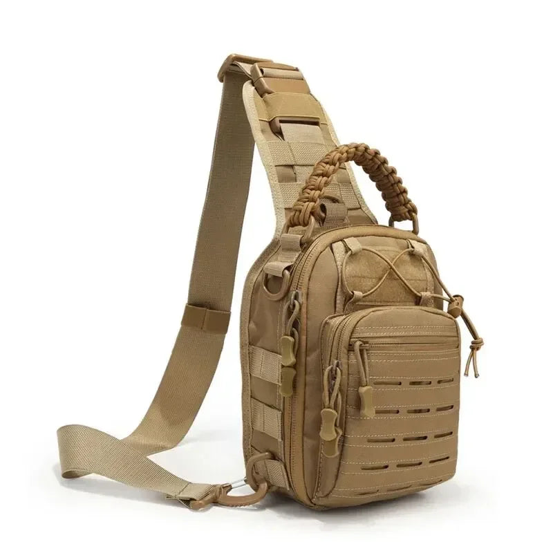 A tan tactical sling bag with a padded strap and braided cord is shown against a white background.