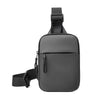 Black Oxford chest bag for men with a strap and pocket on a white background.