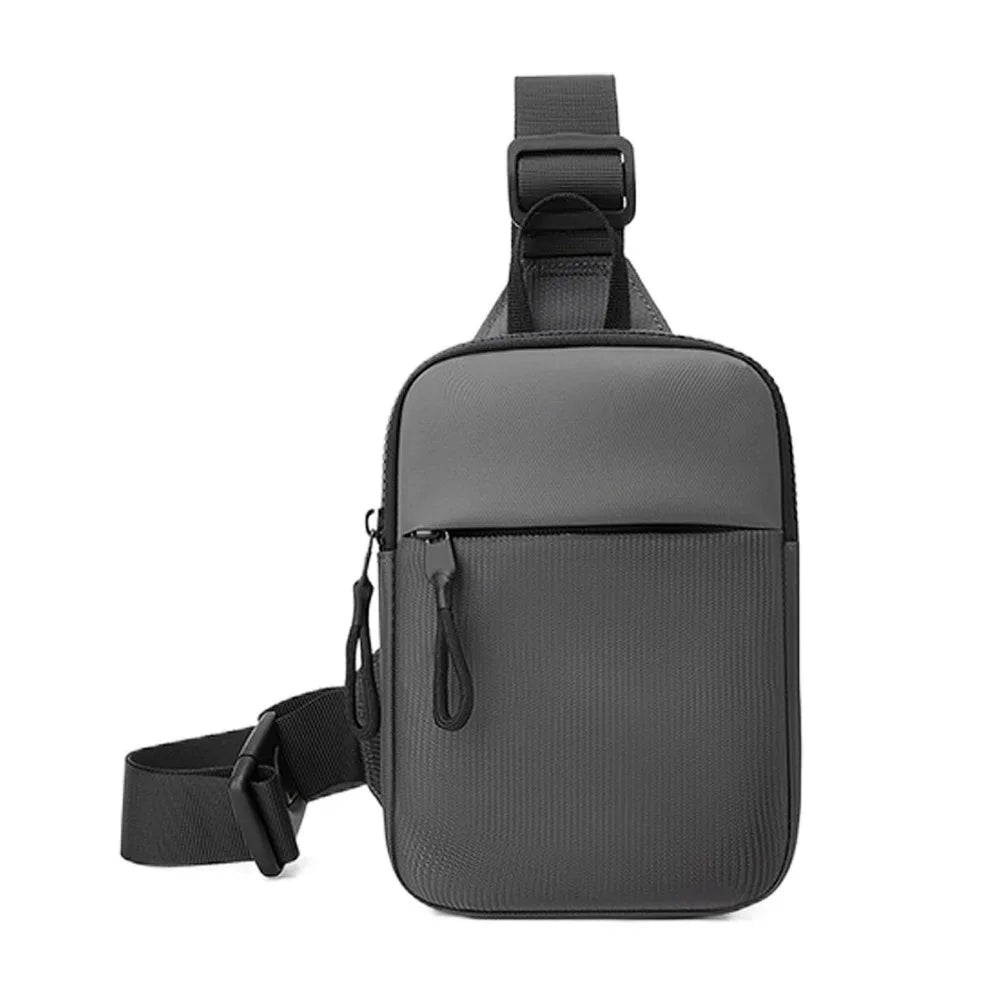 Black Oxford chest bag for men with a strap and pocket on a white background.