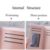 Close-up view of a pink leather card wallet showing internal structure and photo positioning features.