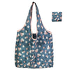 A light blue floral print tote bag with pink accents shown in a vertical orientation.