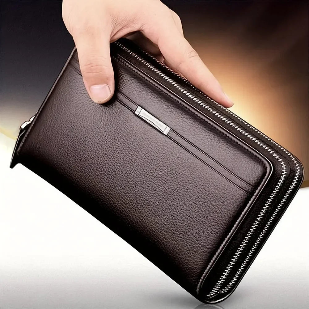 A hand is opening a dark brown leather long zipper wallet clutch for business and daily use.