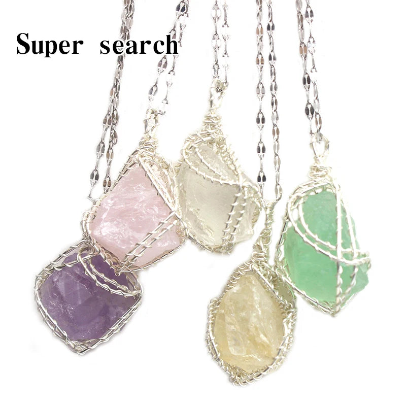 Handcrafted amethyst crystal pendant necklace featuring various colored crystals wrapped with copper wire.