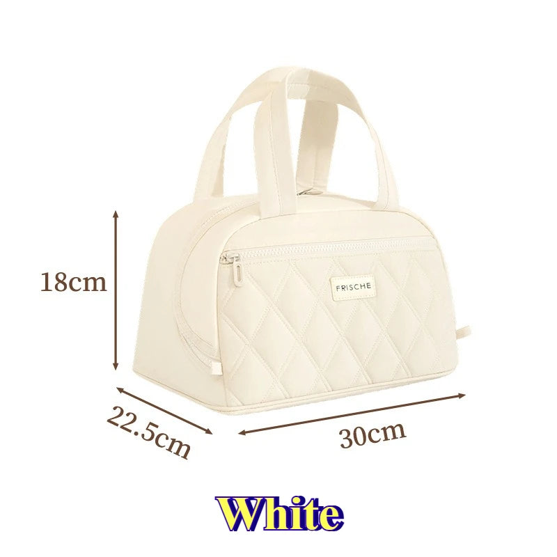 A white insulated PU leather quilted lunch tote bag shown from the top view.