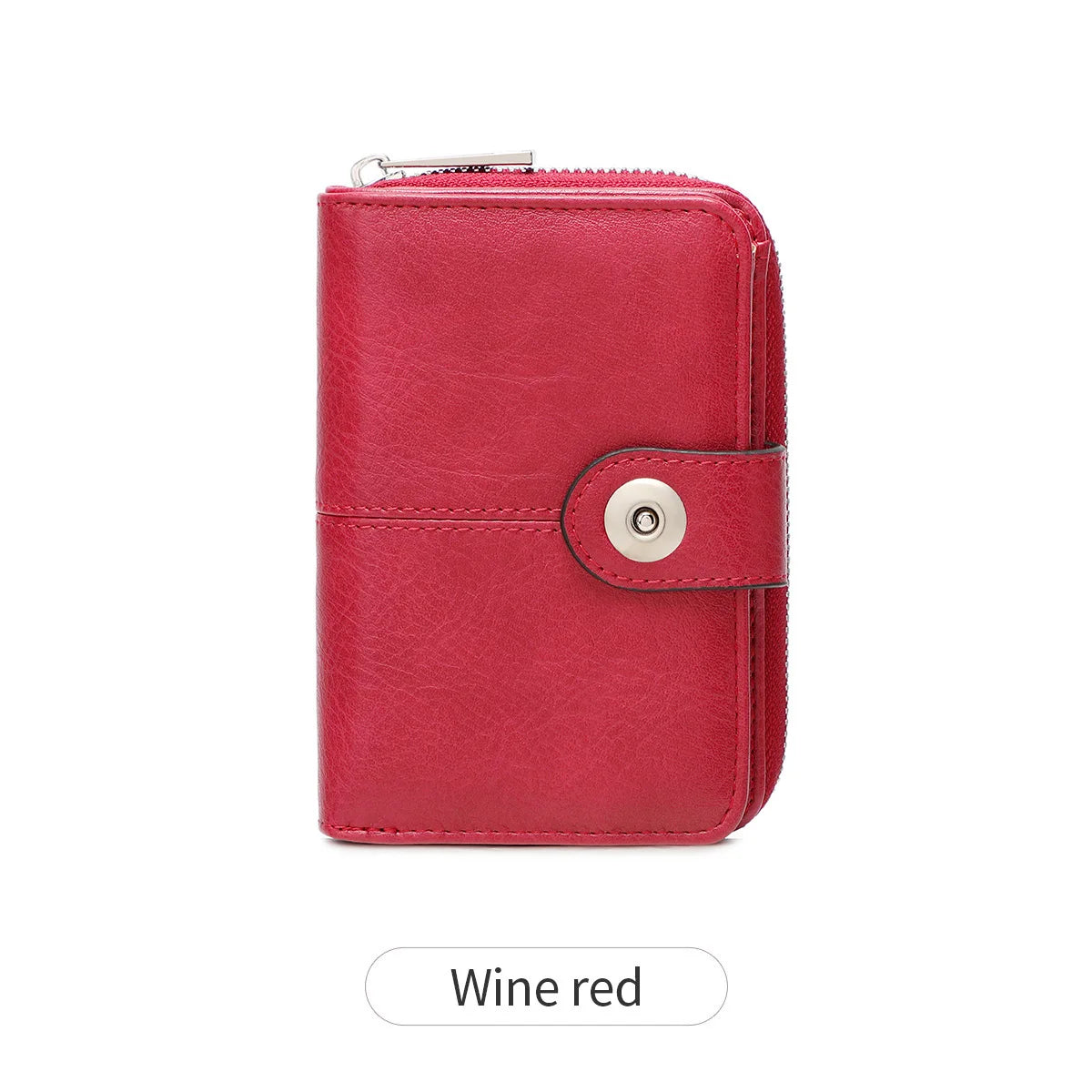 A red leather wallet with a snap closure and a silver coin-shaped button.