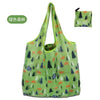 A light green fabric tote bag featuring a repeating pattern of forest animals and trees.