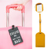 A yellow PU leather luggage tag with an ID card holder attached, shown next to a pink suitcase.