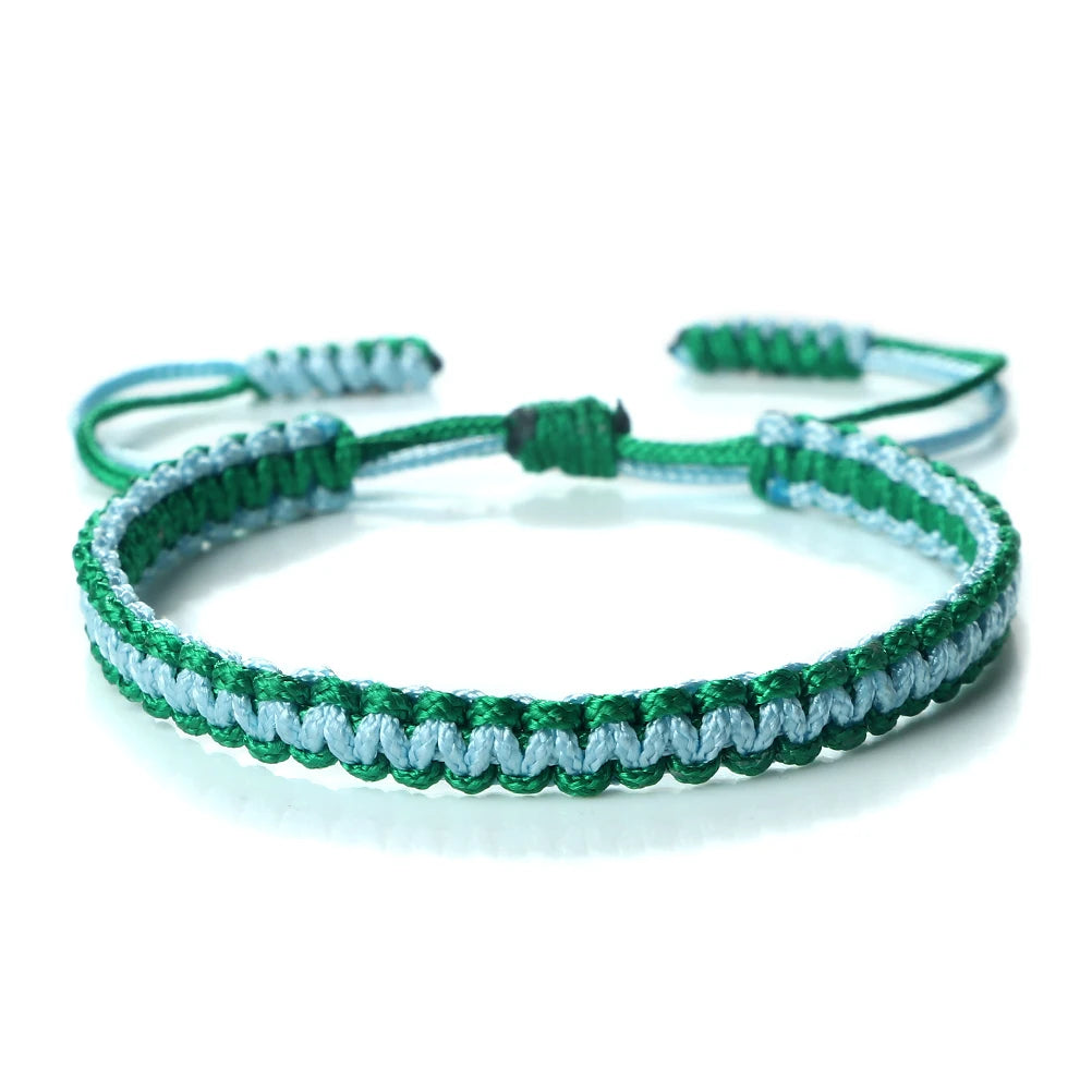 Handmade braided rope bracelet featuring green and blue threads, suitable as a friendship gift.