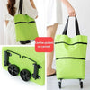 A lime green folding shopping trolley bag being carried by a person.