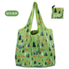 A reusable eco tote shopping bag in green fabric featuring a pattern of forest animals and trees.