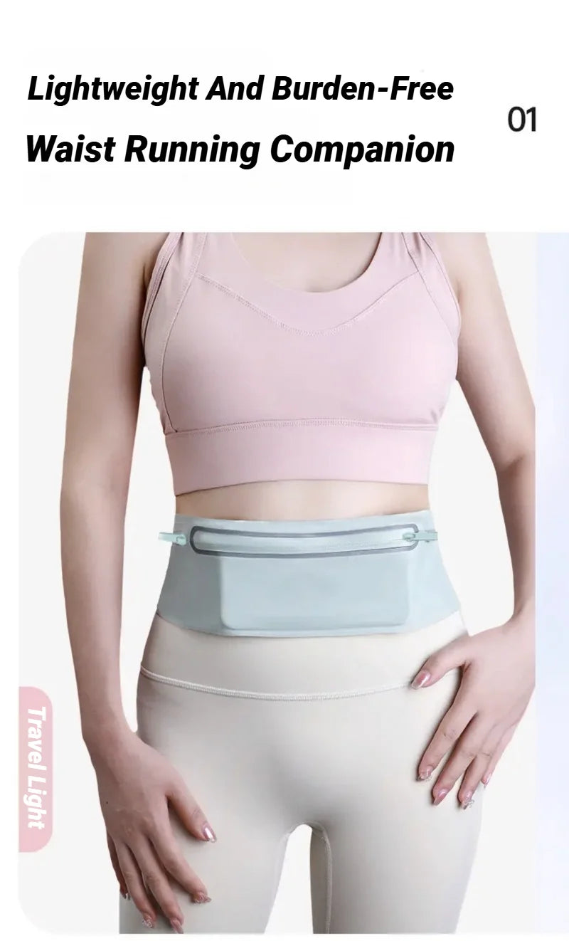 A woman wearing a light pink sports bra and a light blue waist pack for running.