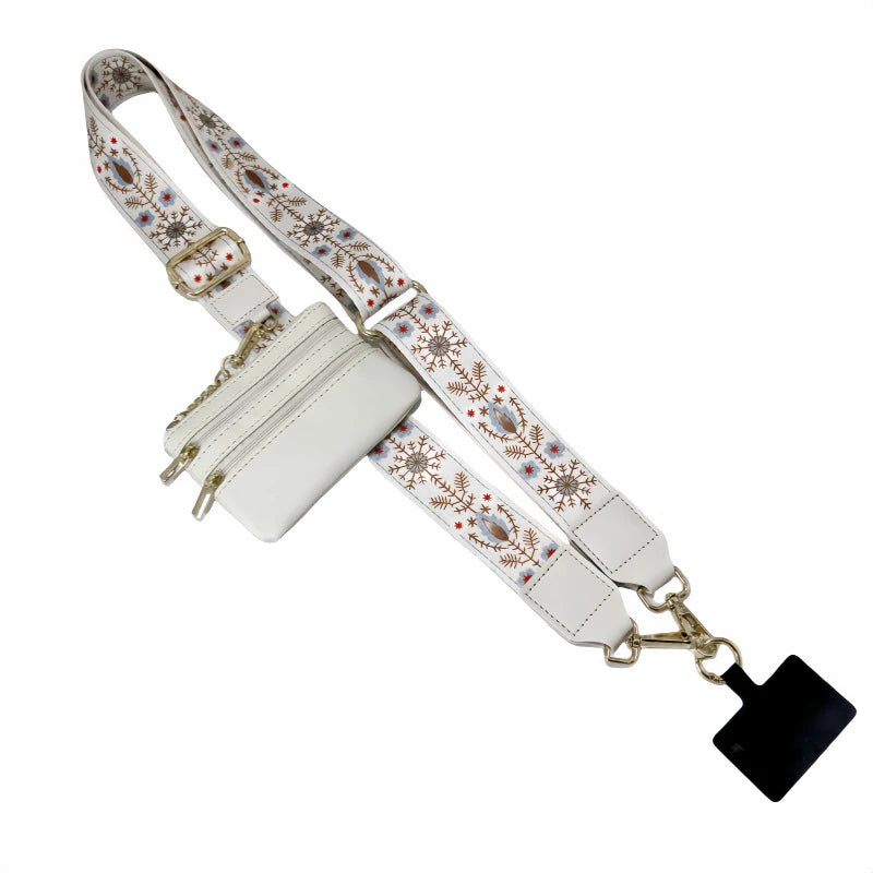 A white phone lanyard with a decorative patterned strap and a detachable leather wallet.