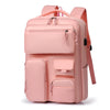 A pink unisex large capacity travel backpack with multiple compartments and straps.