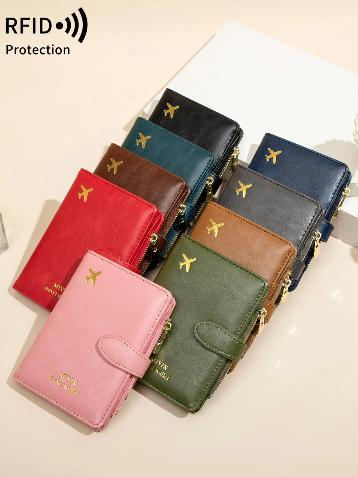 A stack of multi-functional PU leather passport wallets in various shades of green, brown, and blue.