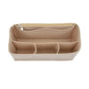 A light beige felt insert liner for a handbag, showing multiple divided compartments.