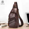 A brown genuine leather men's crossbody messenger bag with a leather strap is displayed on a wooden surface.