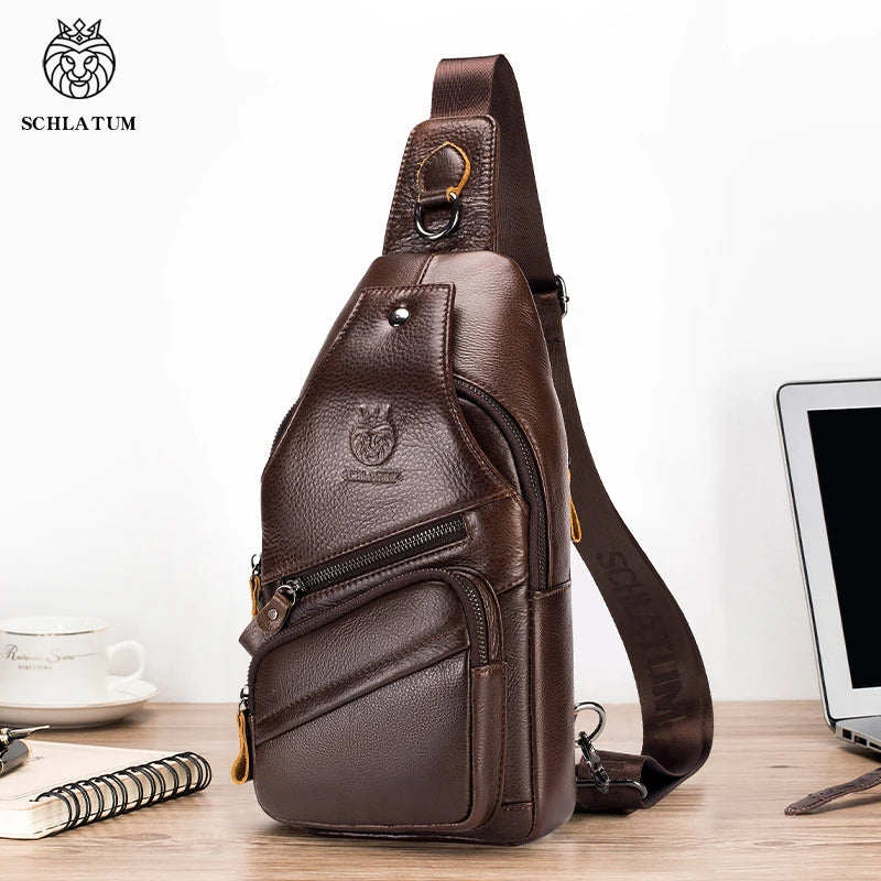 A brown genuine leather men's crossbody messenger bag with a leather strap is displayed on a wooden surface.