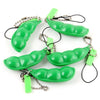 Green oval shaped stress relief fidget toy keychains with metal chains