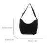 Black leopard print crossbody bag shown with dimensions 26.5cm x 6.5cm and 34cm.