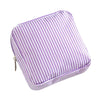 Purple and white striped multi-functional storage pouch.