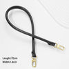 Black cowhide leather bag shoulder strap with gold-toned hardware, shown against a white background.