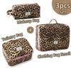 A set of three leopard print bags including a makeup bag and two small clothing bags.