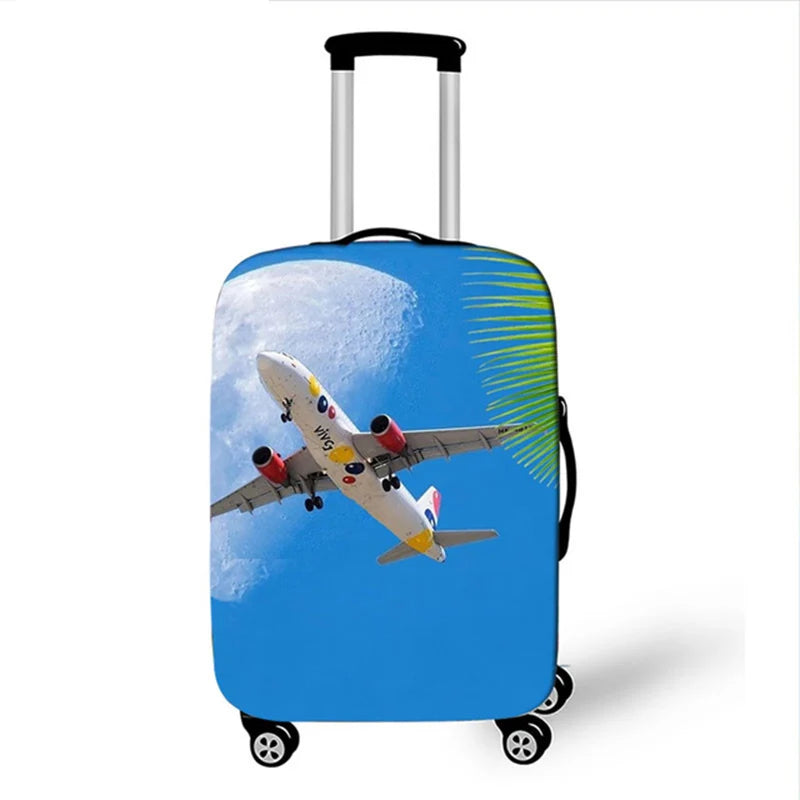 A blue suitcase with a graphic of an airplane flying against a bright blue sky.