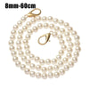Gold-toned pearl strap with a clasp for handbags and purses