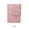 A light pink minimalist women's foldable wallet with a flap and double zipper.