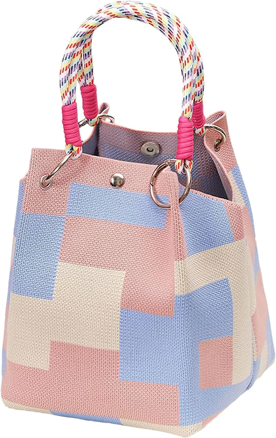 A knitted bucket bag featuring a geometric colorblock pattern in shades of pink, blue, and beige with a striped handle.