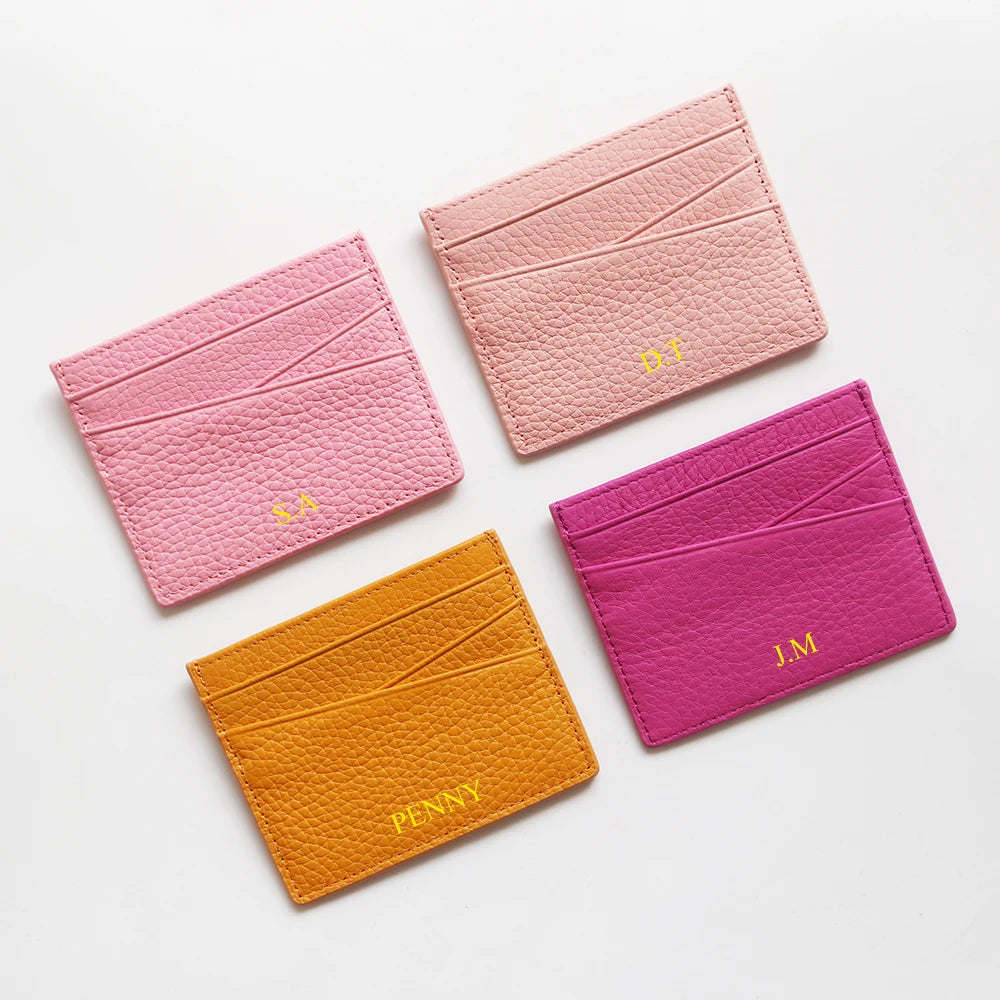 Trois porte-cartes en cuir véritable rose et magenta avec initiales gravées