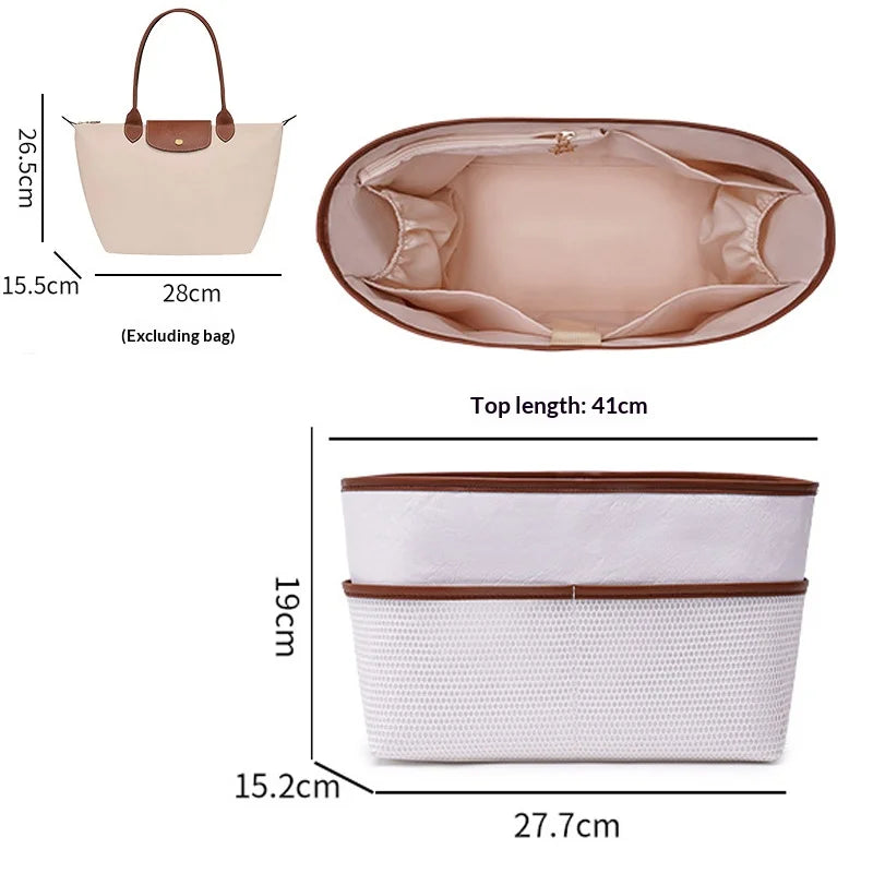 A set of beige and white organizer inserts for a tote bag, including a laptop sleeve.