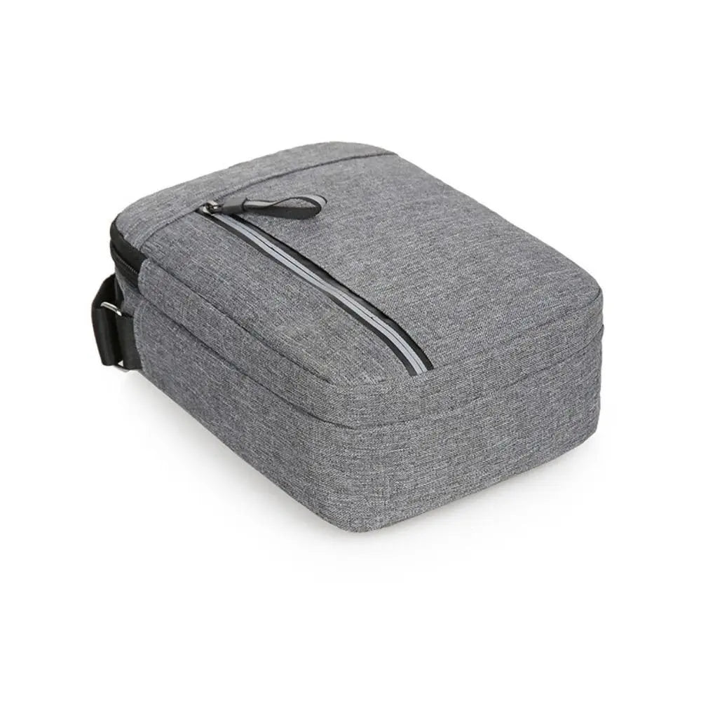 A gray durable waterproof crossbody bag for men shown from above.