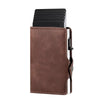 A brown leather card holder with a black sleeve for storing cards.