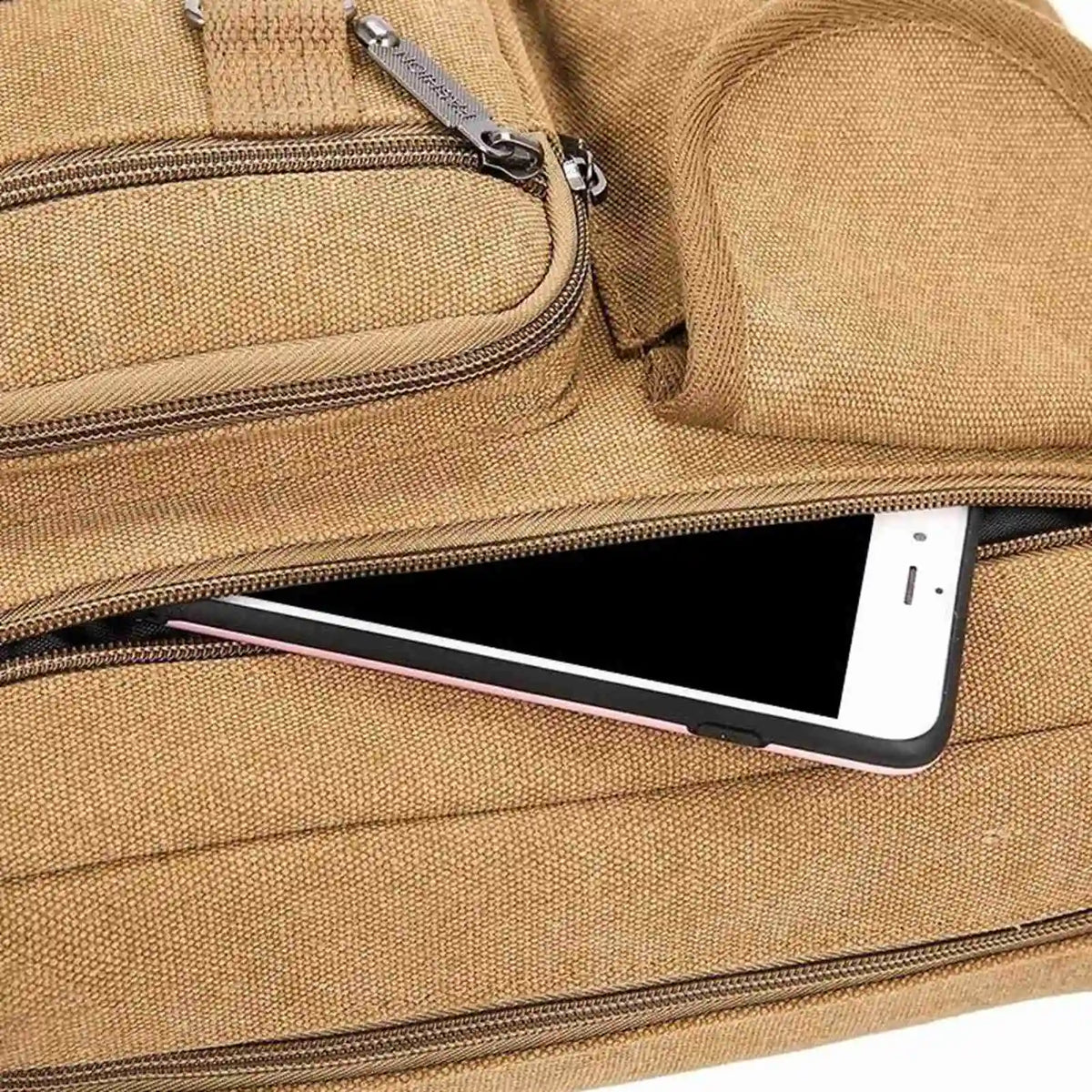 A tan canvas tool bag with multiple zippered pockets, featuring a slot for a smartphone.